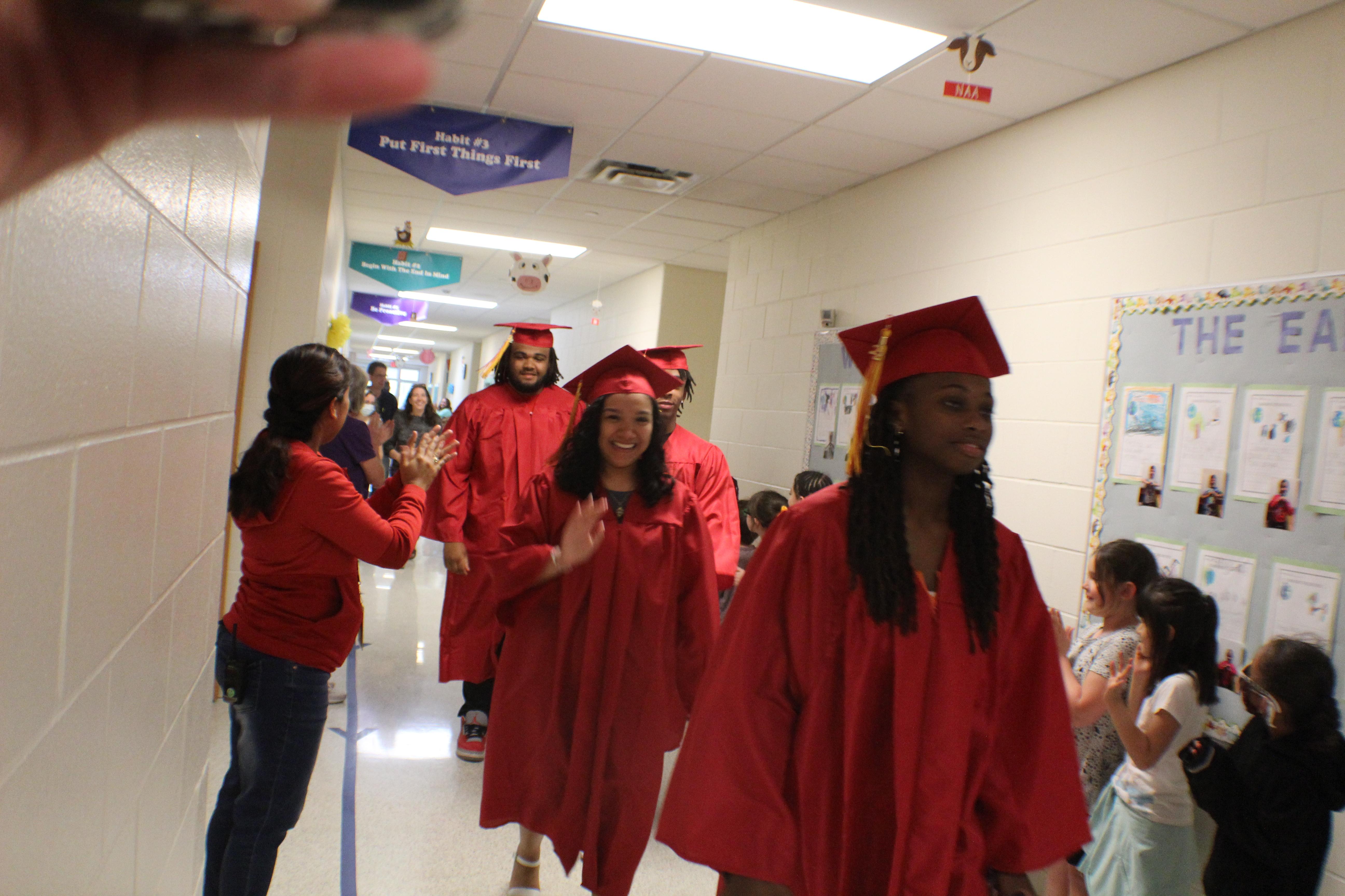 grads walking the halls