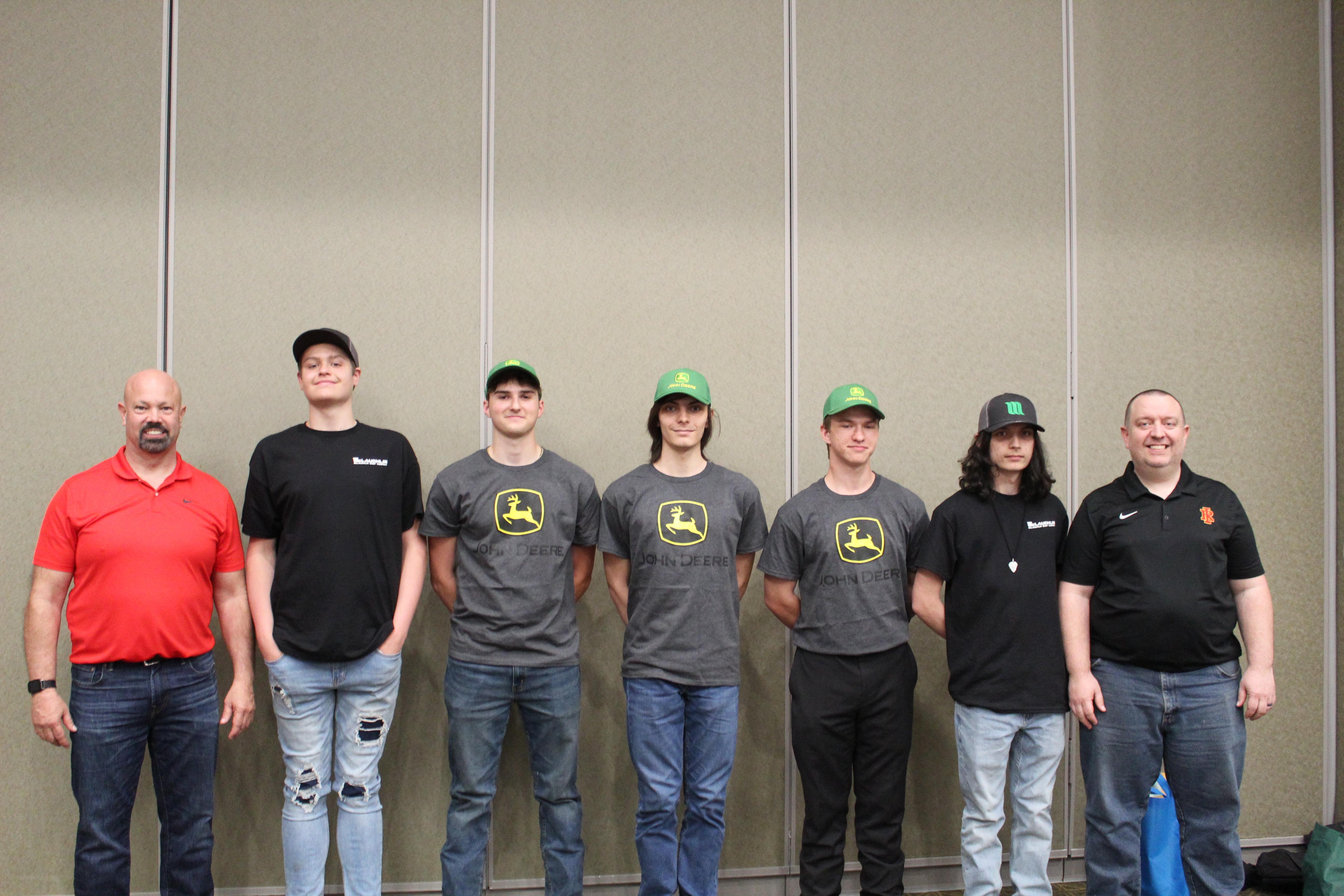 group picture of welding students and their instructors